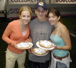 People Eating Fried Dough